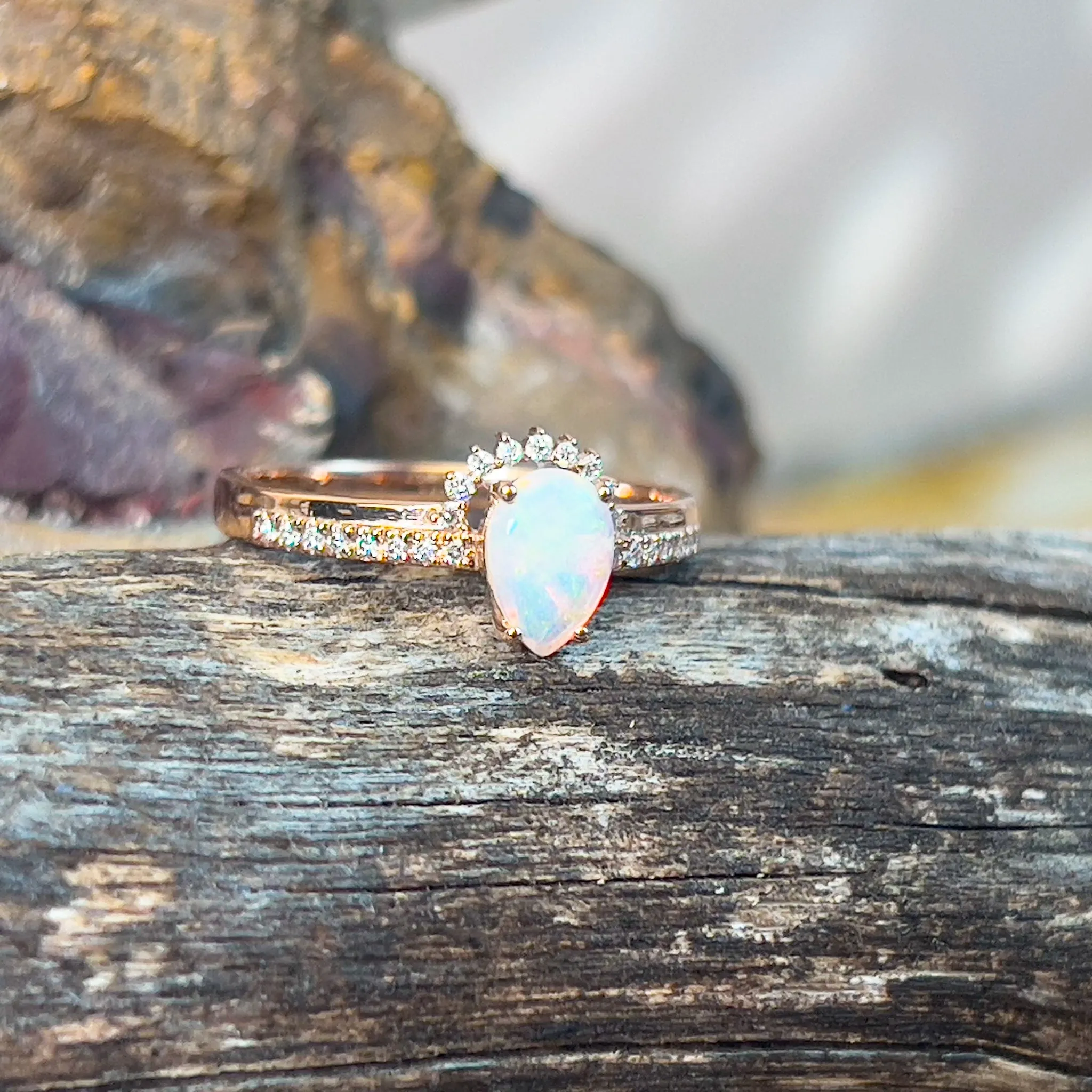 14kt Rose Gold pear shape Opal and diamond ring