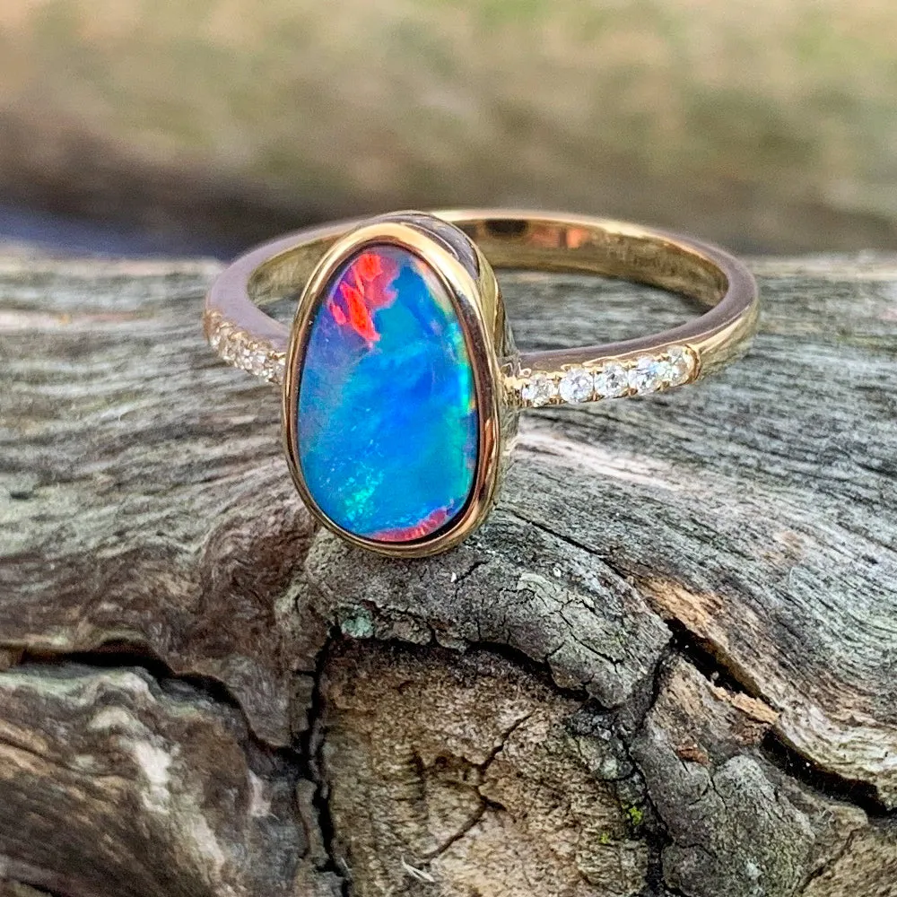 14kt Yellow Gold Opal doublet red green flash and diamond band ring