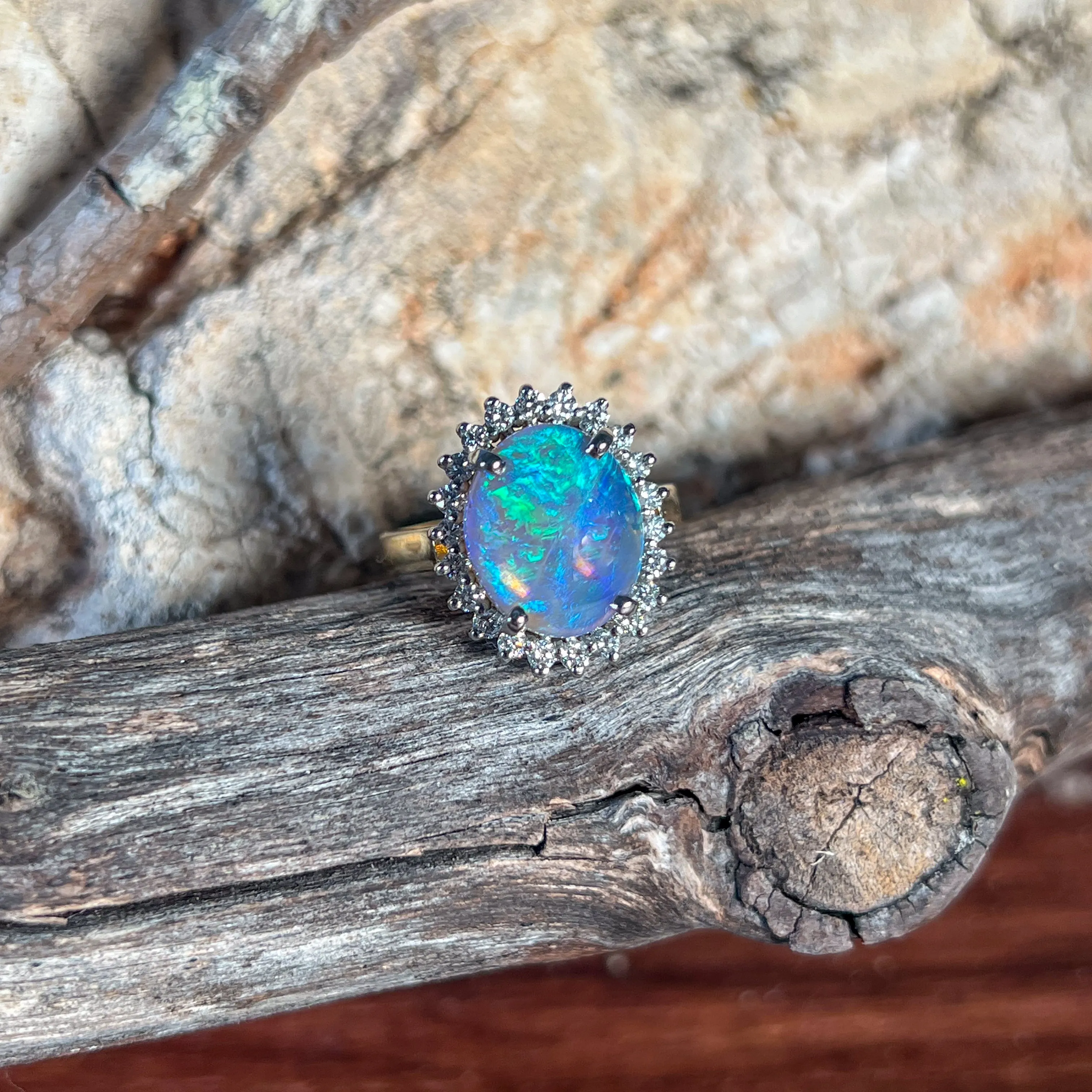 18kt and Platinum cluster Black Opal 4.73ct and Diamond ring