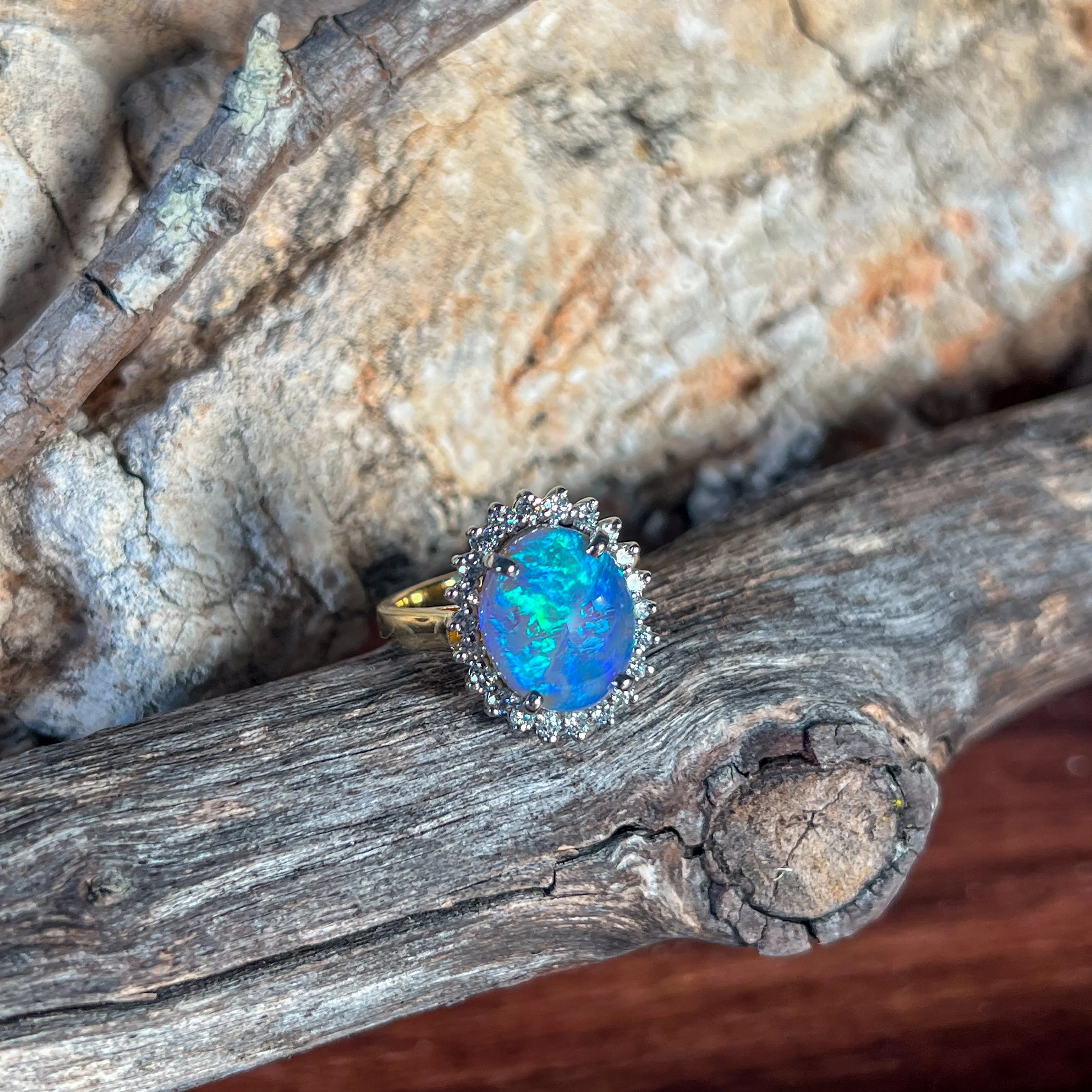 18kt and Platinum cluster Black Opal 4.73ct and Diamond ring