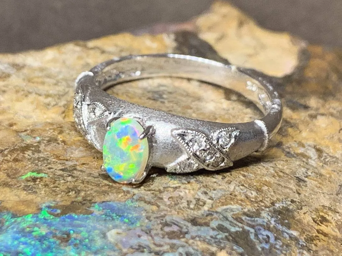 18kt White Gold Crystal Opal and Diamond ring