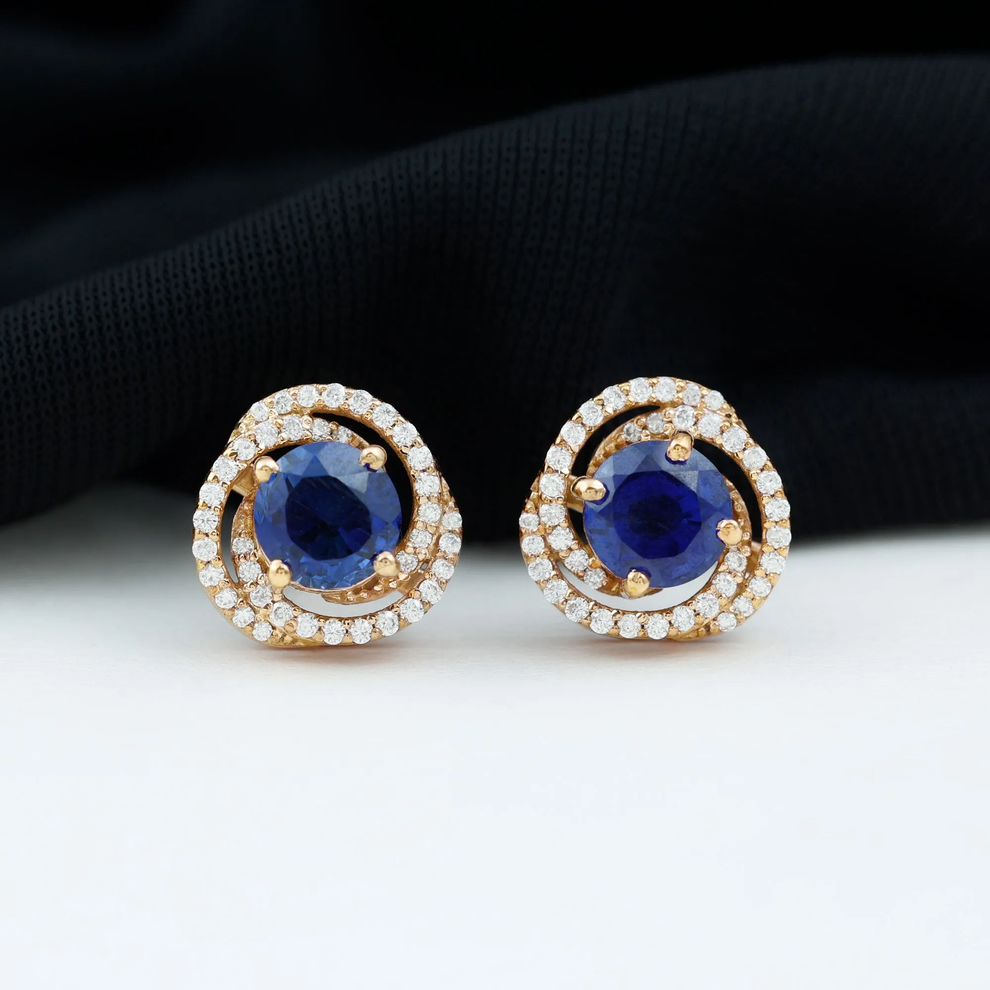 2.50 CT Created Blue Sapphire and Diamond Swirl Stud Earrings