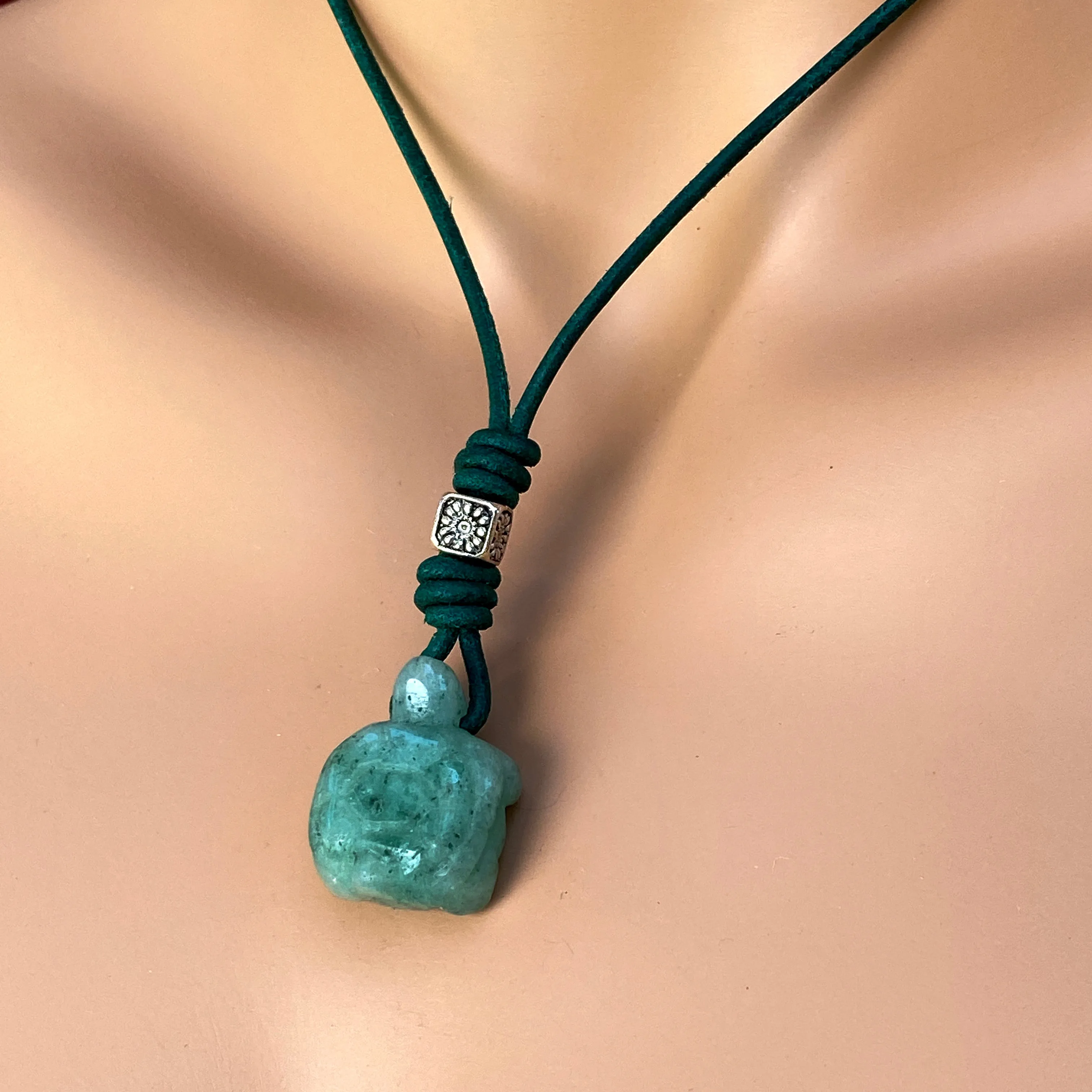 Jade Turtle gemstone on green leather with Sterling Silver