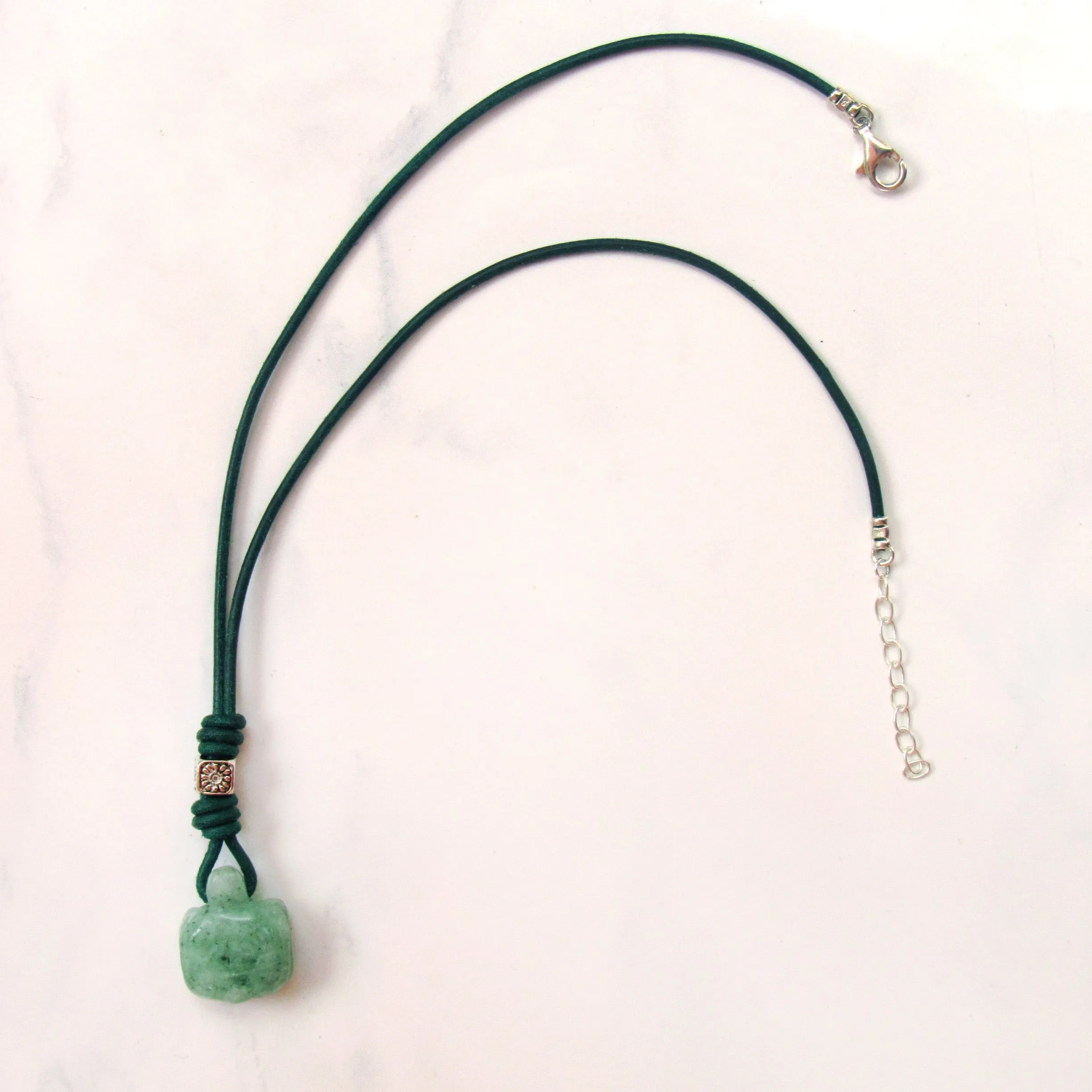 Jade Turtle gemstone on green leather with Sterling Silver