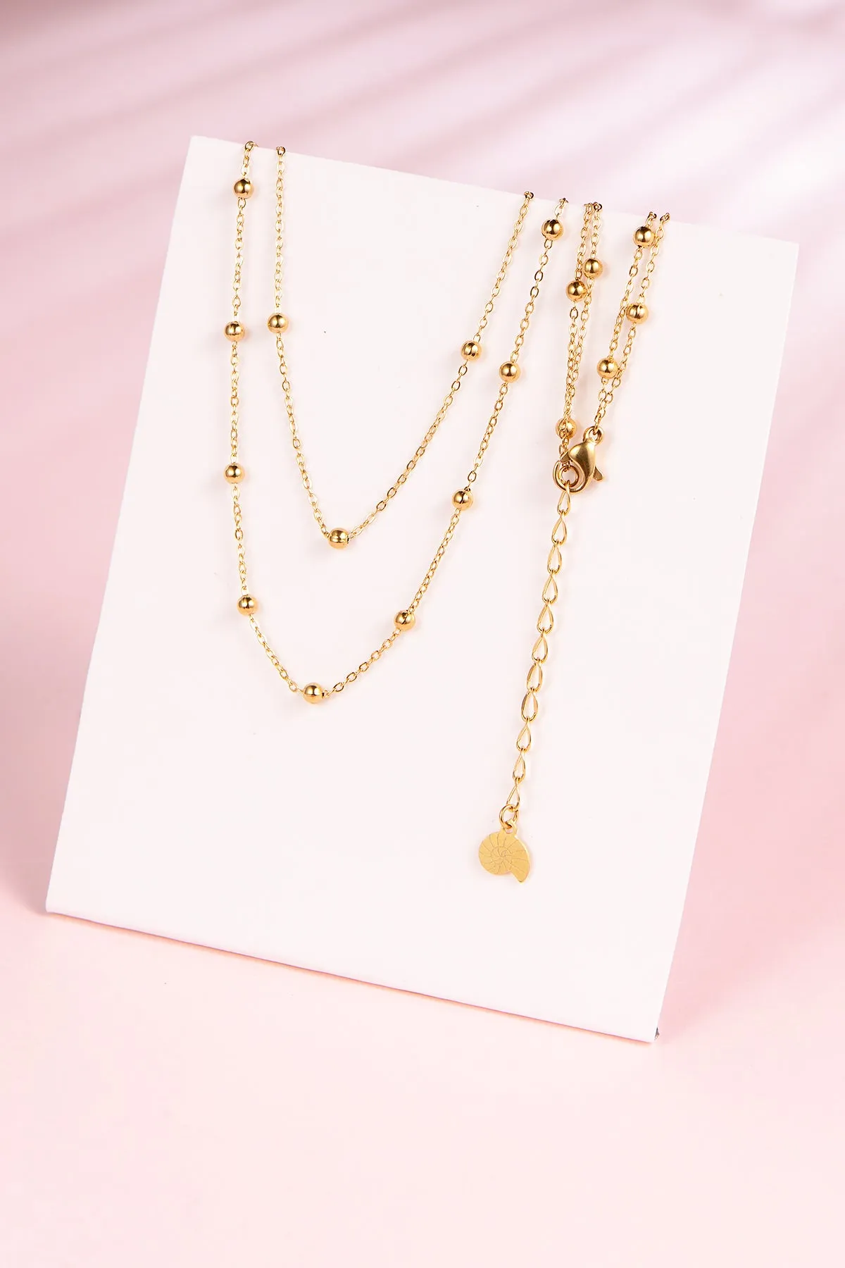 Layering Necklaces Stars and Moon in Gold