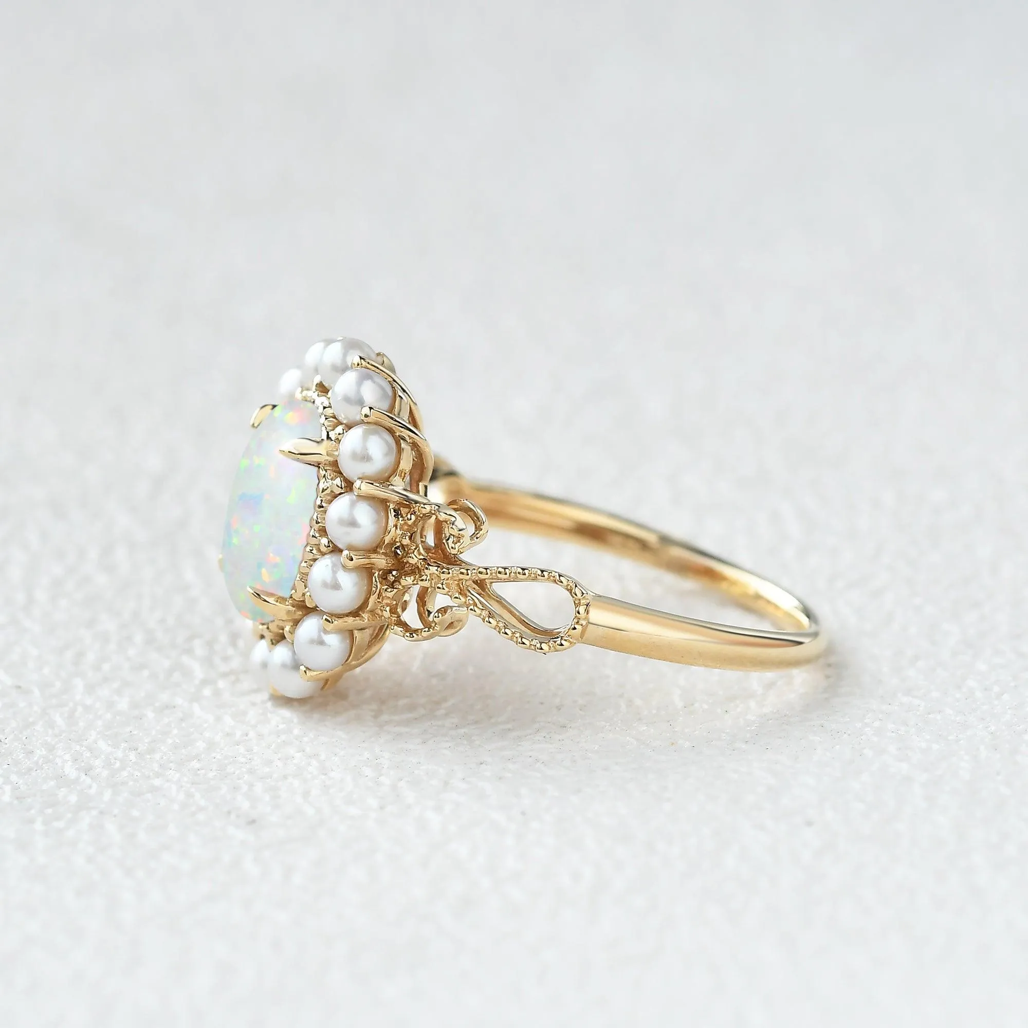 Oval Cut Lab Opal & Pearls Halo Rose Gold Ring